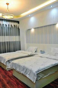 Yiguangnian Fashion Hotel เฟิ่งหวง ภายนอก รูปภาพ
